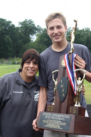 Paul Bischoff and Coach Giunta-Mayer pose with the state trophy 