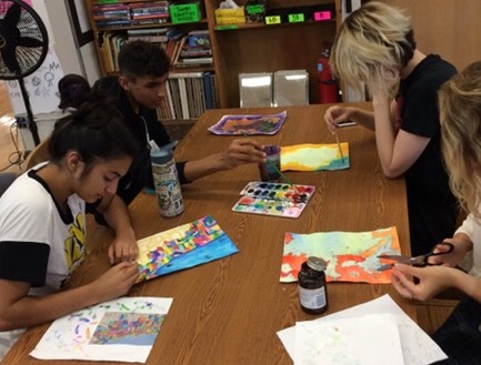 5th Period Painting 1 students are hard at work creating their colorful pieces of original art.