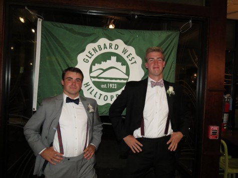 President Connor O'Shea (Left) and Vice President Danny Riley (Right) pose in front of the Glenbard West logo at Homecoming 2015. 