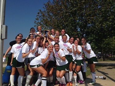 The girls celebrate after their win in the St. Louis Tournament