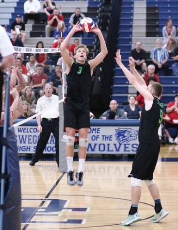 Paul Bischoff setting the ball during a Glenbard West Varsity game. 