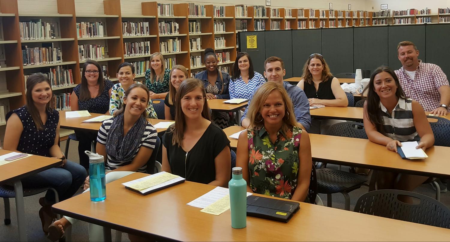 Front row of desks: Rachel Urista, Allison Filipak, Emily Trowbridge, Tracy Dohrer
Second row of desks: Sarah Walsh, Alicia Hollander, Rachel Nolan, Robert Sanders, Sydney Morse
Third row of desks: Amanda Minogue, Deandra Bass, Diane Robinson, Kelly Egan-Pater, John Sigmund
Not pictured: Michael Souza