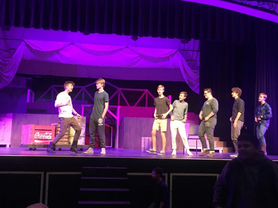 The Footloose assemble practices during Tech Week. 