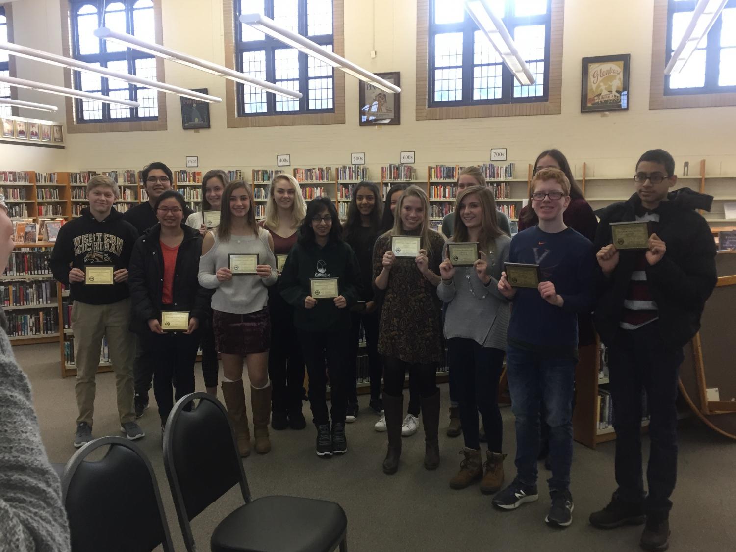The 2nd Quarter Departmental Honorees lined up with their plaques. Photo courtesy of Lisa Hohe.