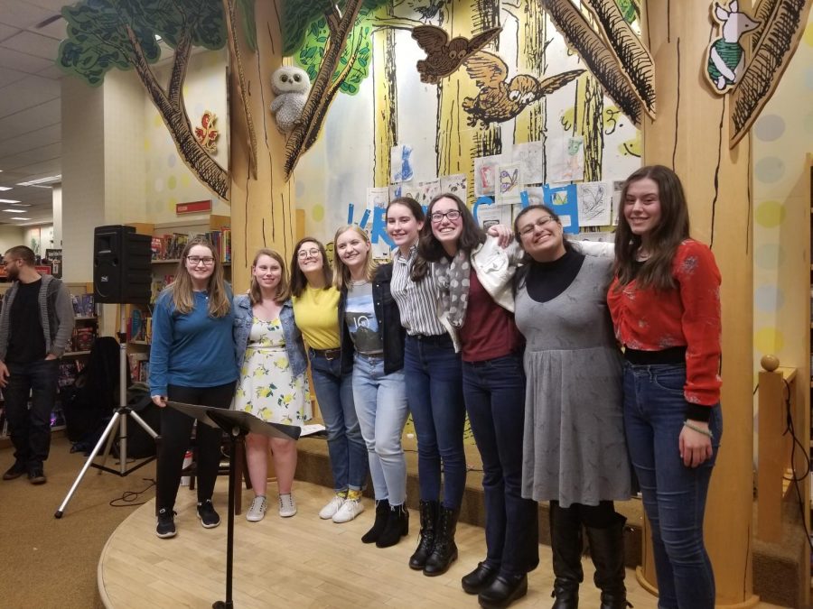 Glenbard West combatants Molly MacDonald, Ellie Ostroff, Rosa Galvan, and Ainsley Soane pose with their Geneva competitors after the Write Club event. 