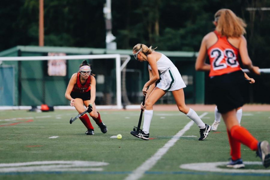 Evelyn Erickson (junior) makes a move to advance past a Deerfield defender. 

