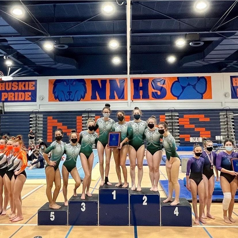 Photo of girls' gymnastics team after a recent meet. Photo acquired from gymnast Brooklyn Ford.