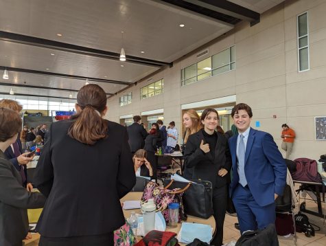 The Forensics team enjoys a moment between rounds during a tournament.